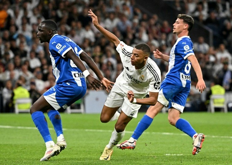 Mbappe took two deft touches to shake his marker and get a sight of goal. AFP