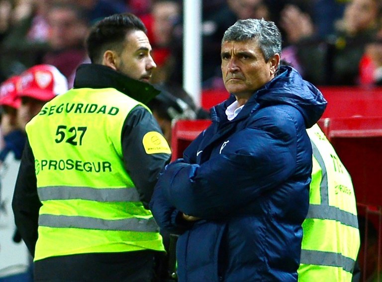Malagas former coach Juande Ramos looks on during the Spanish league football match against Sevilla December 17, 2016