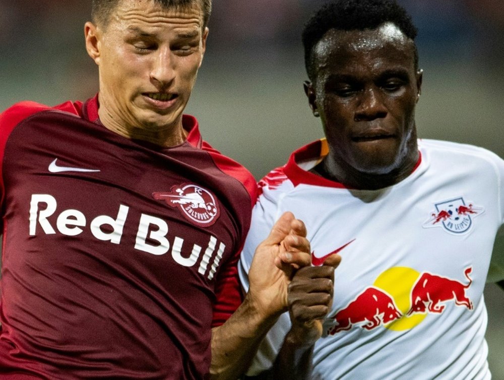 Salzburgs Stefan Lainer and Leipzigs Bruma go shoulder to shoulder in 2018. AFP