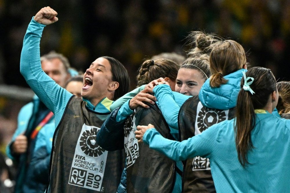 Sam Kerr (L) supported her team from the bench. AFP