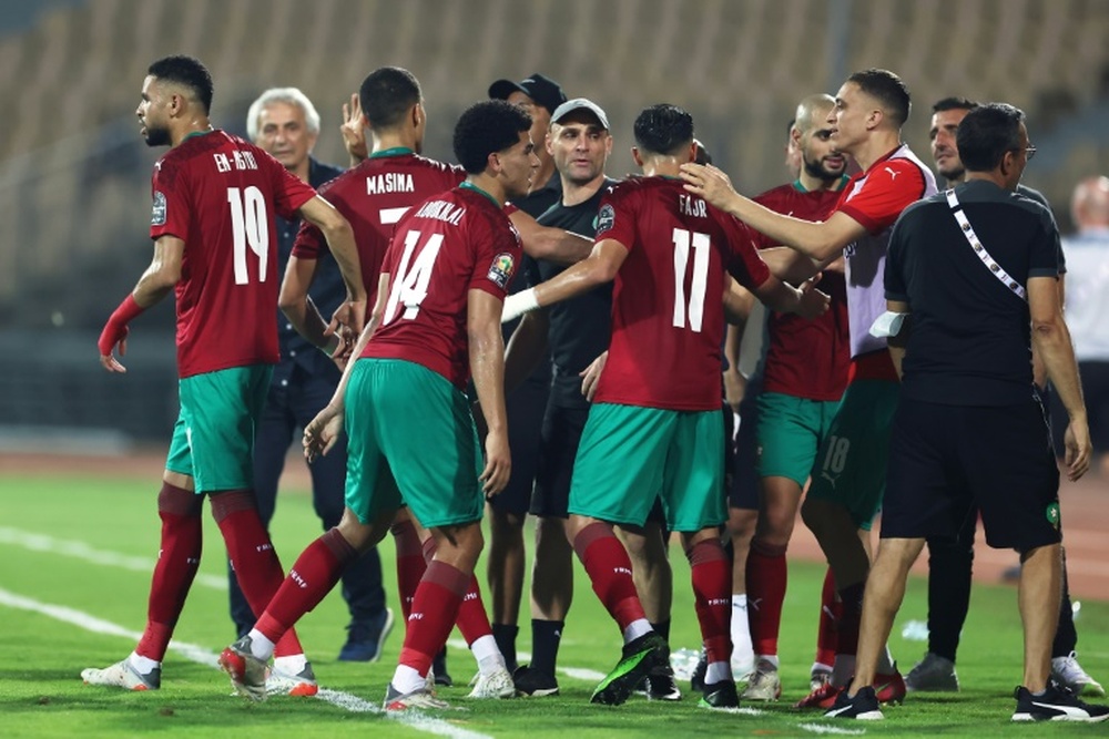 Morocco players celebrate after Zakaria Aboukhlal scored their second goal against the Comoros. AFP
