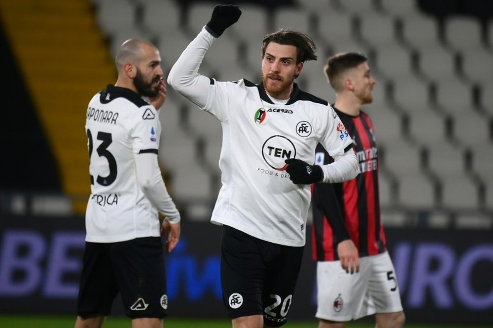 Spezia teach Milan a 'lesson' to give Inter chance at top spot. AFP