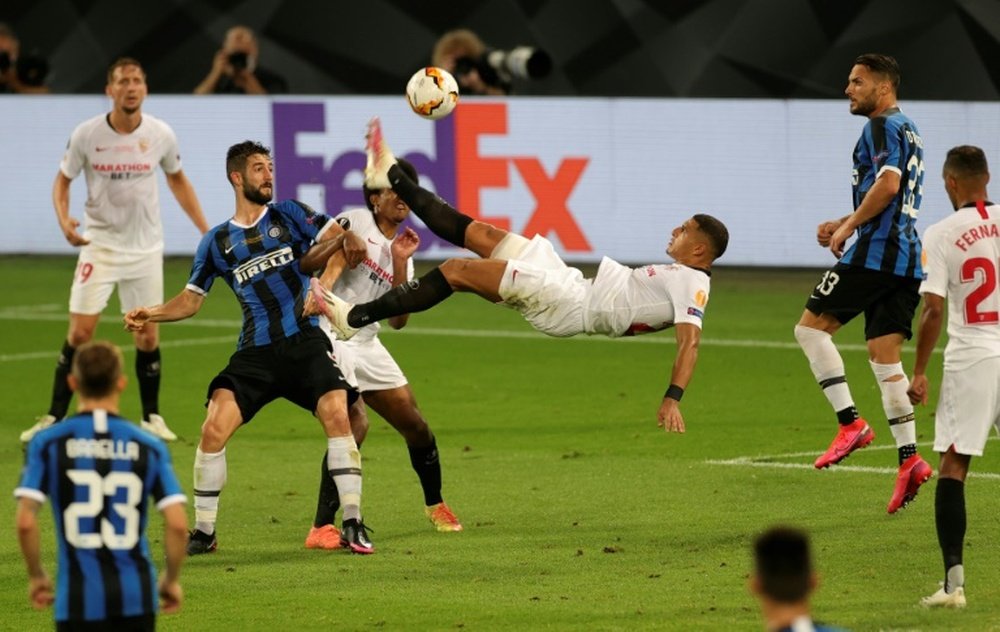Diego Carlos' overhead kick helped Sevilla win their sixth Europa League. AFP