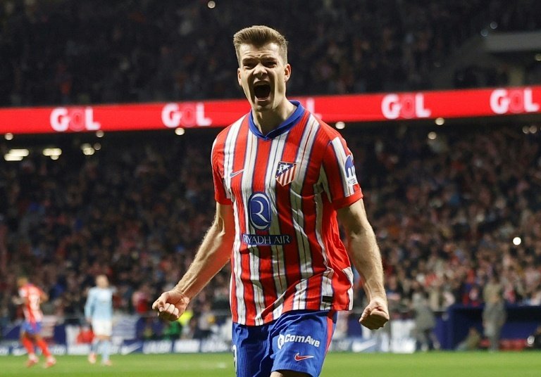 Frustrated 10-man Atletico snatch Celta draw to remain second