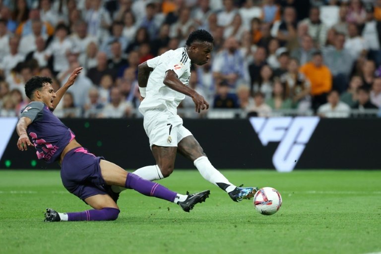 Vinicius started on the bench but created a goal for Rodrygo Goes before scoring himself. AFP