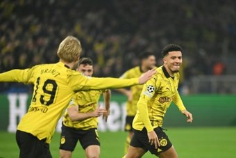 A third-minute goal from Jadon Sancho and Marco Reus' late strike sent Borussia Dortmund through to the Champions League last eight with a 2-0 win on Wednesday, sealing a 3-1 aggregate victory.