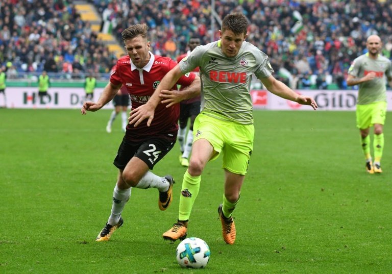 Struggling Cologne secure first point of season