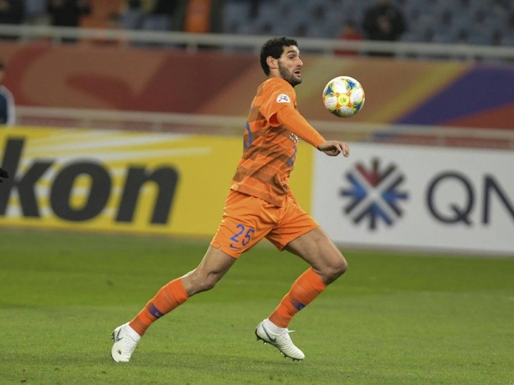 Marouane Fellaini scored a late winner for Shandong Luneng. AFP