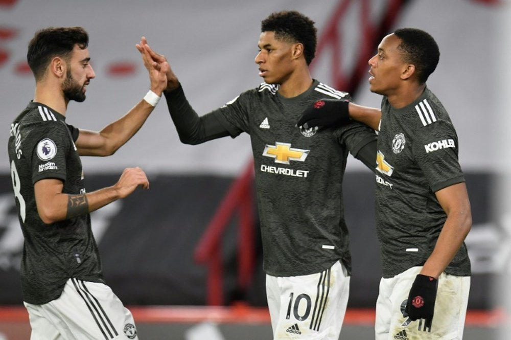 Comeback kings Man Utd maintain perfect Premier League away record. AFP