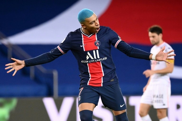 Blue-haired Mbappe helps PSG keep pace with Lille ahead of Sunday clash. AFP