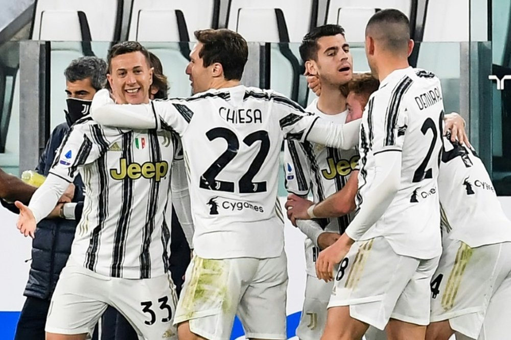 Morata (rear R) scored only his fifth league goal of the season. AFP