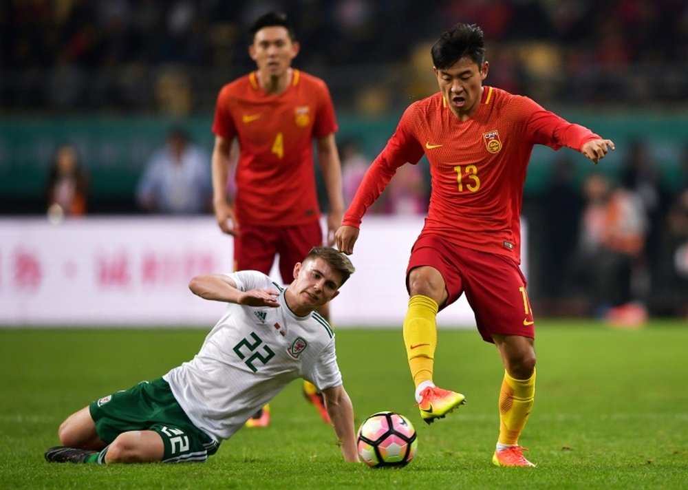 China have ambitions of becoming a superpower in world football. AFP