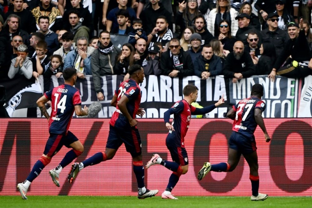 Razvan Marin (2R) earned Cagliari a 1-1 draw at Juventus. AFP