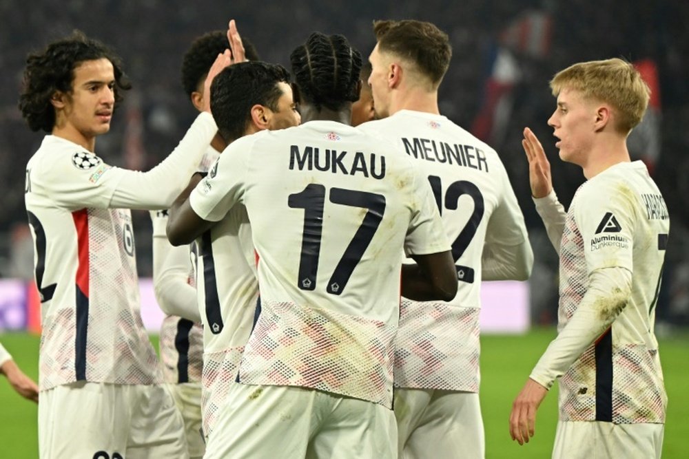 Haraldsson (R) gave Lille real hope of reaching the Champions League quarter-finals, AFP
