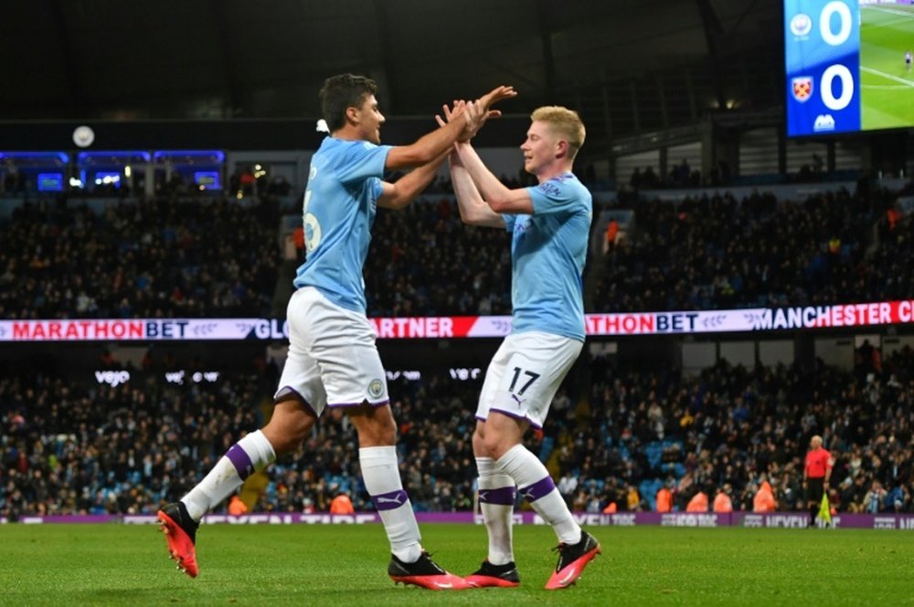 Rodri and De Bruyne gave Man City a comfortable win over West Ham. AFP