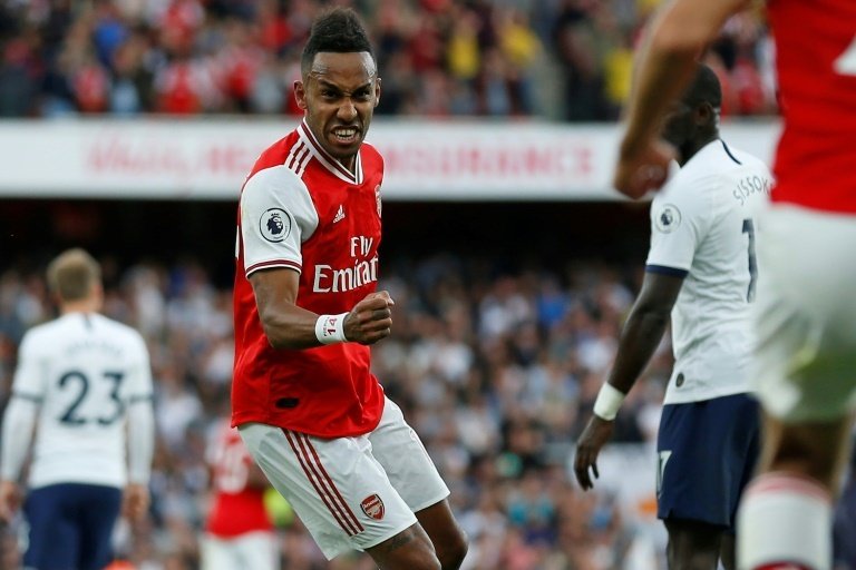 Arsenal fight back to salvage point against Spurs. AFP