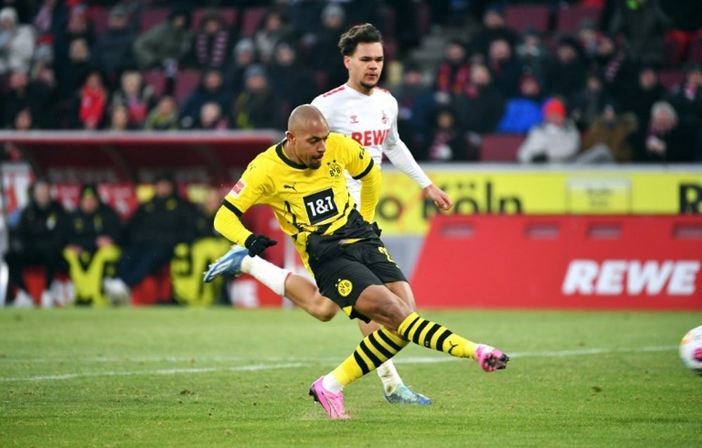 Donyell Malen scored twice as his side won 4-0 away at Cologne. AFP