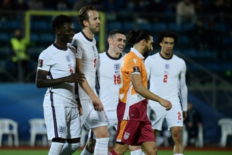 Harry Kane celebrates with his England team-mates against San Marino. AFP