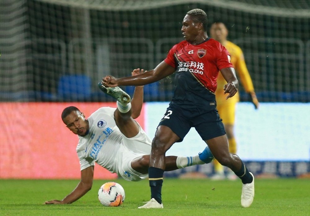 John Mary (R) was sent off after complaining about alleged racist abuse. AFP