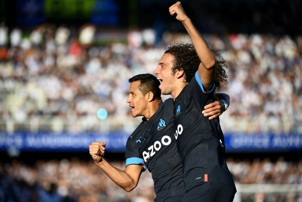Alexis Sanchez (L) got on the scoresheet as Marseille won at Auxerre. AFP