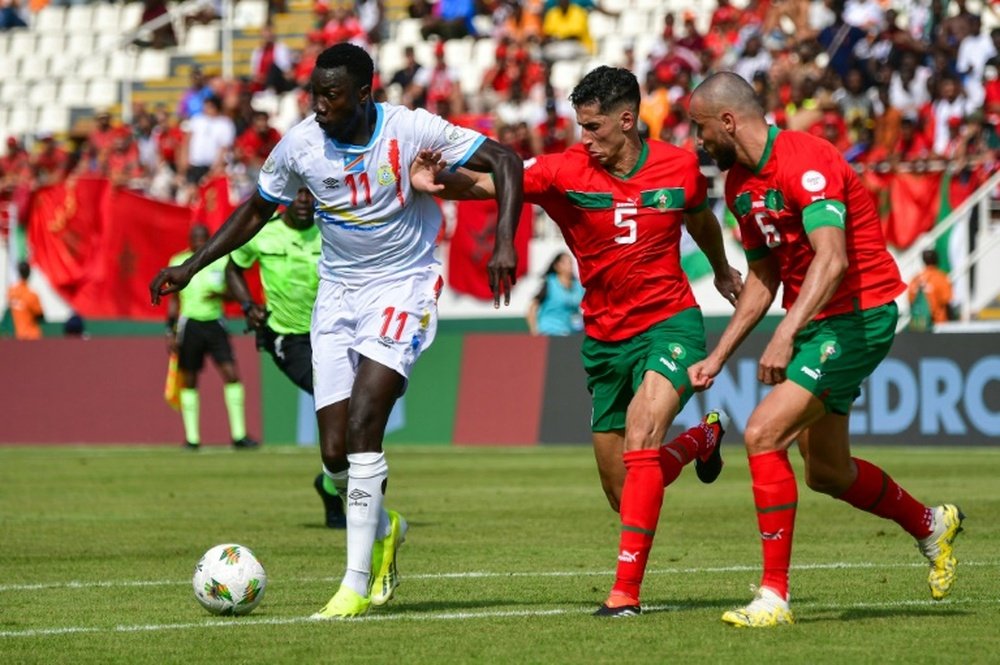 Mvumpa (L) scored DR Congos equaliser in a 1-1 draw with much-fancied Morocco. AFP