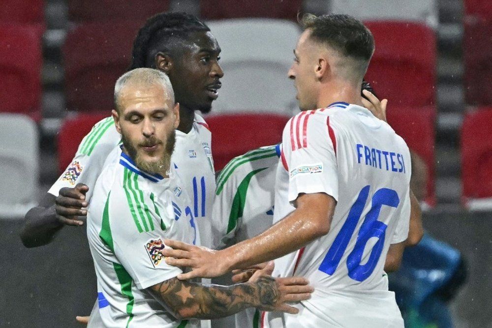 Moise Kean (C) and Davide Frattesi scored Italy's goals against Israel. AFP
