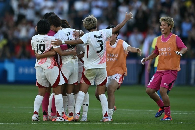 Momoko Tanikawa scored a stunning 96th-minute winner as Japan netted twice in injury time to come from behind and beat Brazil 2-1 in the Olympic women's football tournament on Sunday.