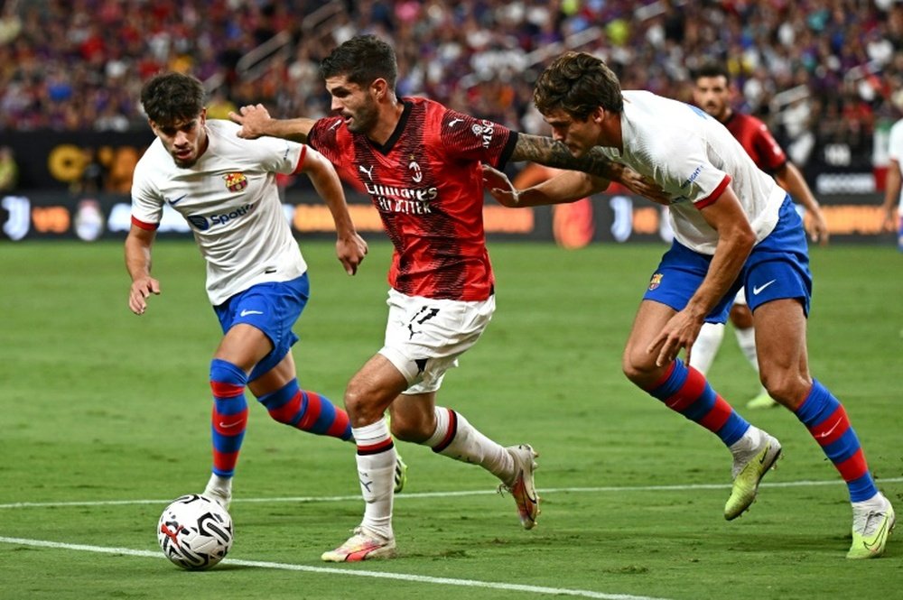 Christian Pulisic (C) scored on his Serie A debut. AFP