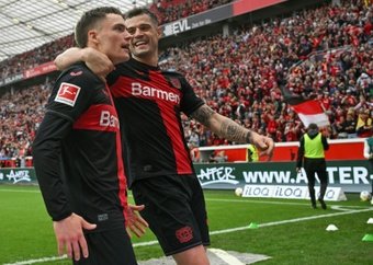 Florian Wirtz and Granit Xhaka will both stay with freshly-minted Bundesliga champions Bayer Leverkusen beyond the summer, sporting director Simon Rolfes said Monday.