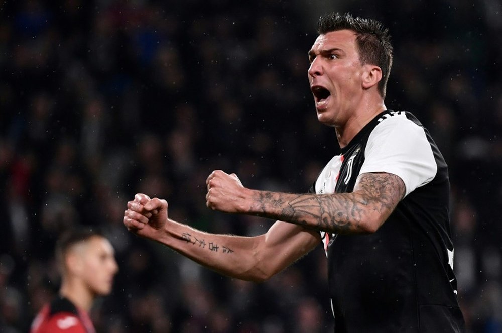 Mario Mandzukic is still hungry for success at AC Milan. AFP