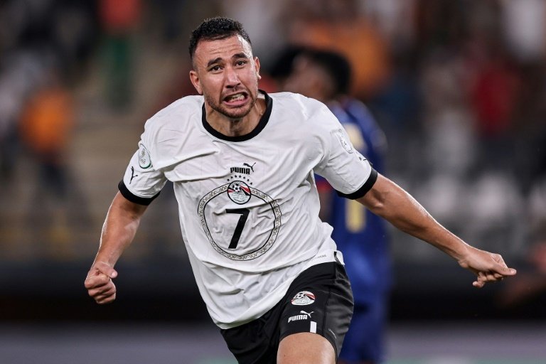 Trezeguet scored twice for Egypt in the first seven minutes of a 2026 World Cup qualifier. AFP