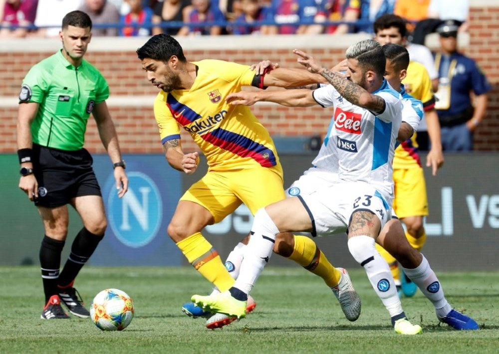 Suarez's brace, Griezmann goal power Barca over Napoli