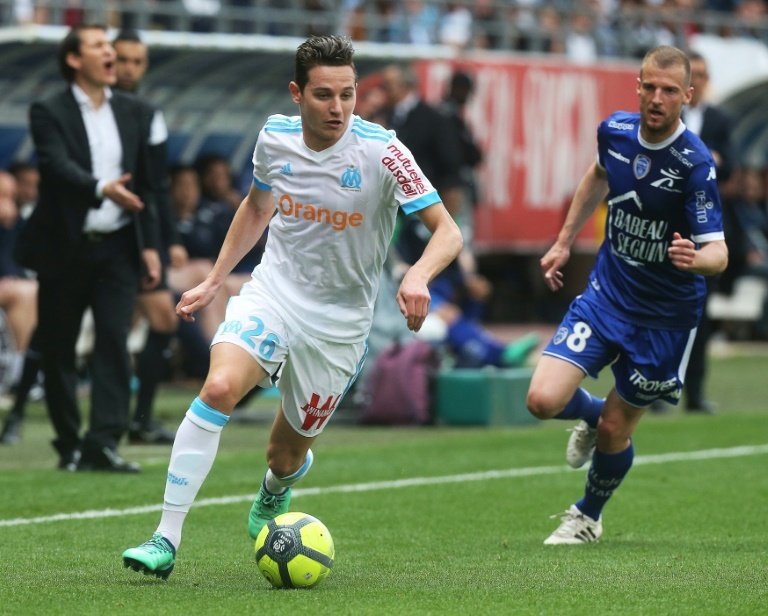 Thauvin's late goal keeps Maseille level with Lyon. AFP