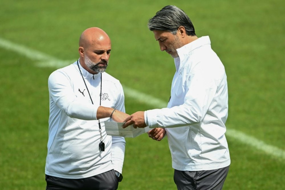Contini (L) was Switzerland coach Murat Yakin's assistant during Euro 2024 in Germany. AFP