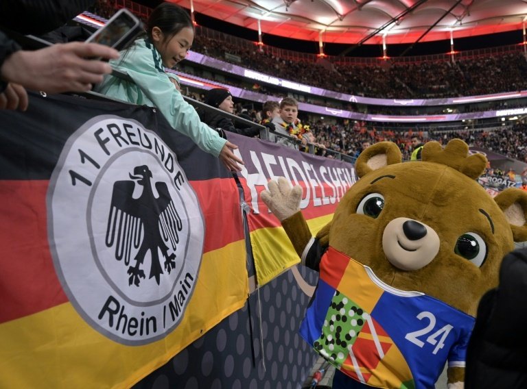 The mascot for the upcoming Euro 2024 Albaert greets fans. AFP
