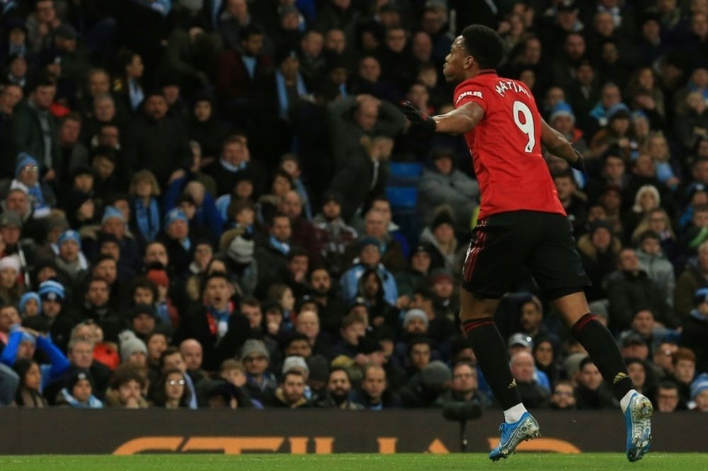 United win battle of Manchester to leave City 14 points off top. AFP