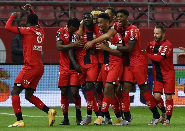 Leaders Rennes stay unbeaten but held by bottom side Dijon. AFP