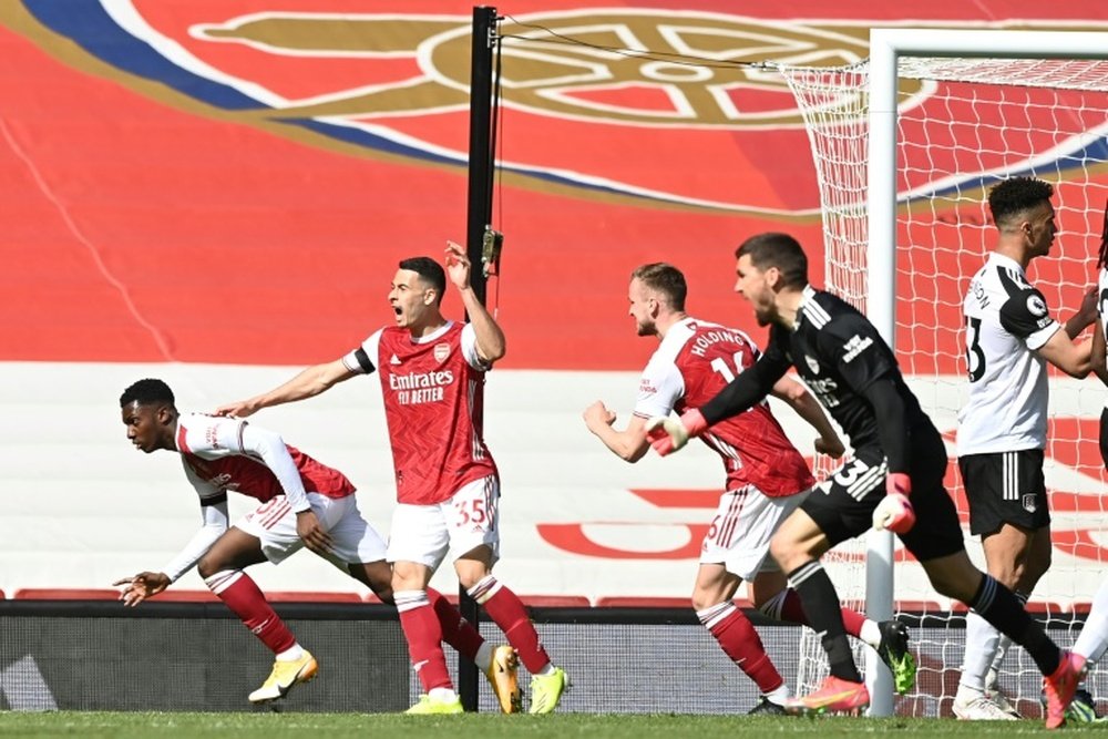 Eddie Nketiah (L) got Arsenal a late equaliser v Fulham. AFP