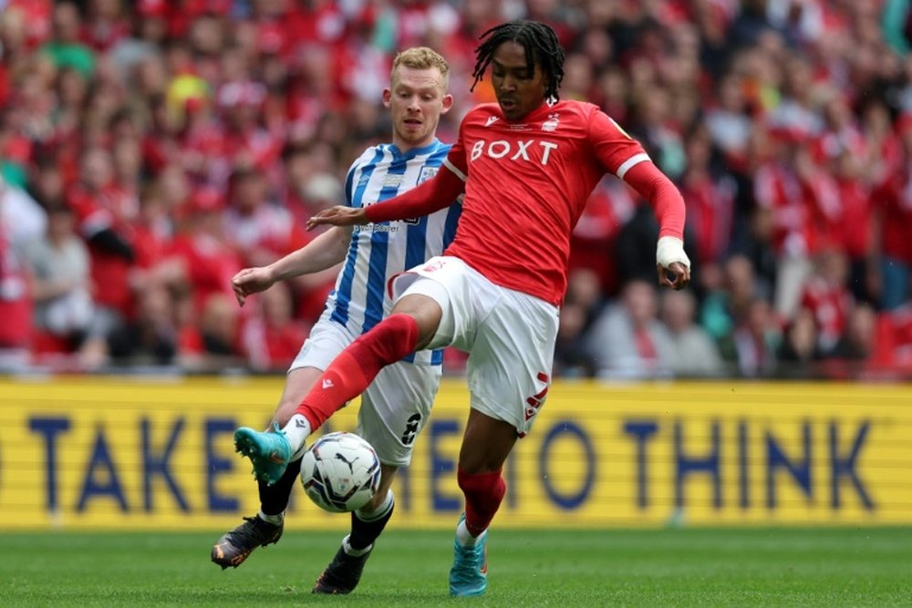 Tottenham sign Spence. AFP