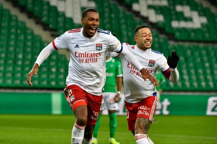 Lyon crush Saint-Etienne to stay in touch at the top