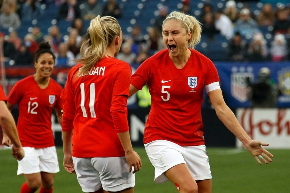 Steph Houghton (right) will be England captain in France. AFP