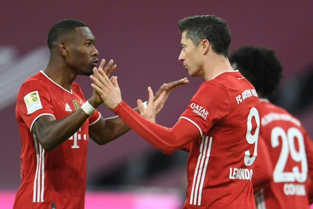 Alaba and Lewandowski would have to quarantine on their return. AFP