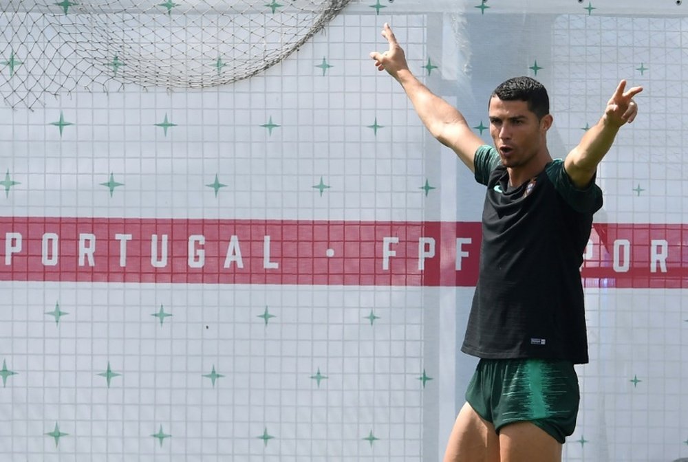 Ronaldo's Portugal will take on Uruguay in the last 16. AFP
