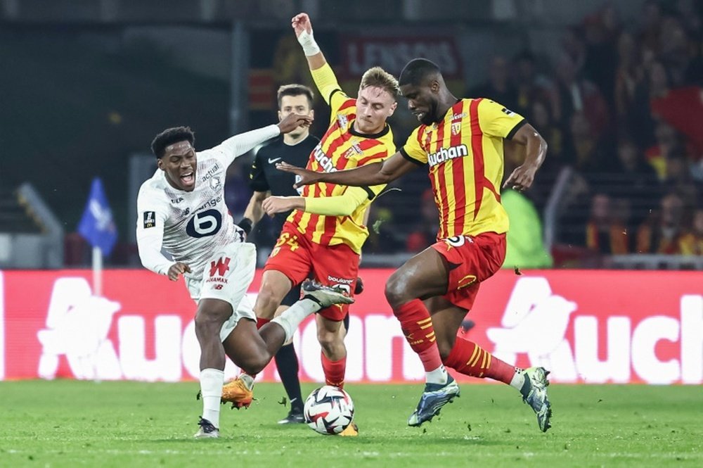 Lille forward Jonathan David (L) was in action on Saturday. AFP