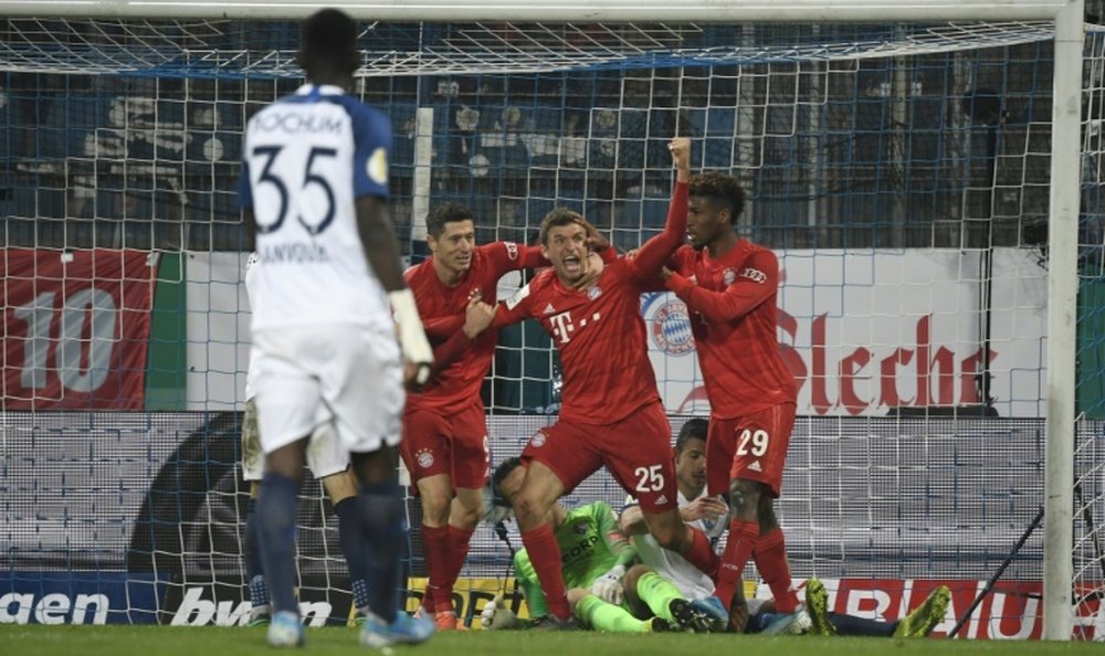 Thomas Mueller scored a late winner for Bayern in the cup tie at Bochum. AFP
