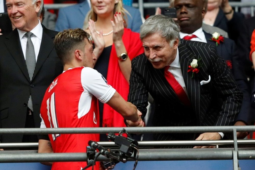 Kroenke is used to criticism from Arsenal fans. AFP