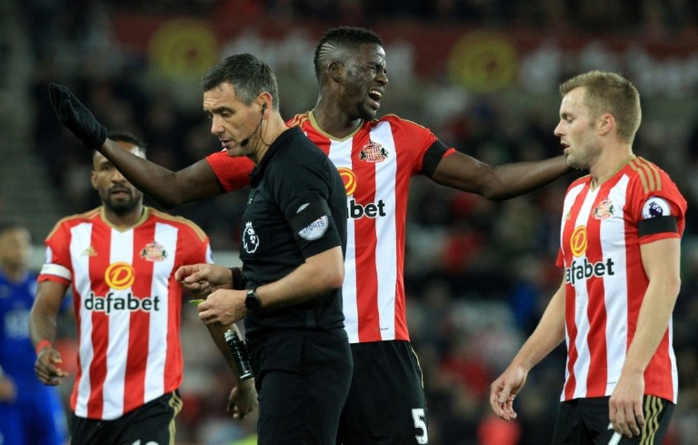 Sunderlands defender Papy Djilobodji (C), pictured in December 2016, appeared to swing his arms at West Brom midfielder Darren Fletcher at an 86th-minute free-kick
