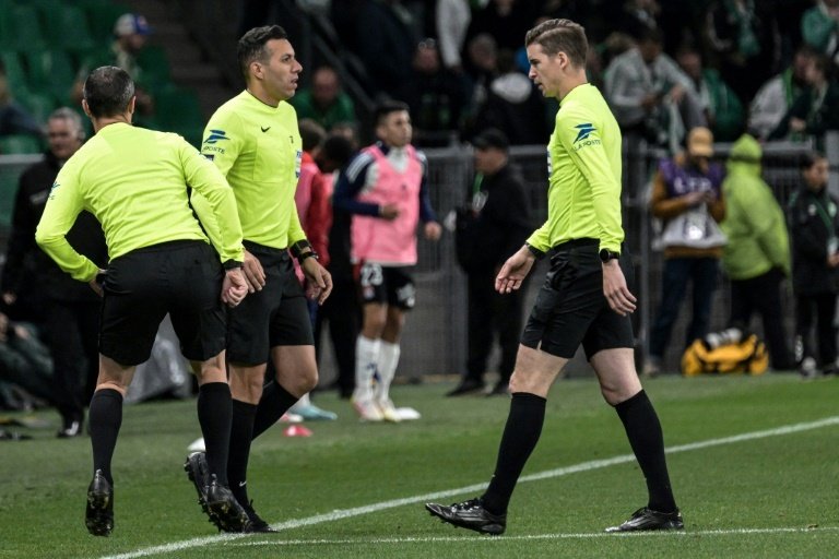 Linesman hit by projectile as Saint-Etienne edge toward safety with Lyon win