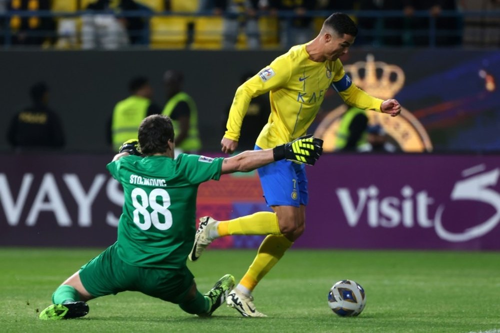 Ronaldo scored late as Al-Nassr swept into the Asian Champions League quarter-finals. AFP