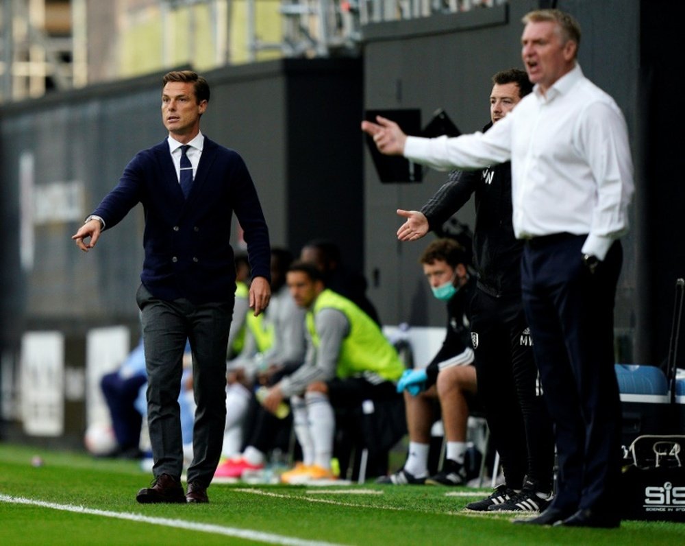 Scott Parker (L) did not like the owner apologising for the team's performance. AFP